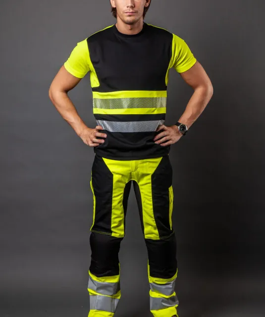 6513 SIGNALISATIEBROEK MET KNIEZAKKEN EN SPIJKERZAKKEN EN ISO 20471 KLASSE 2 Geel