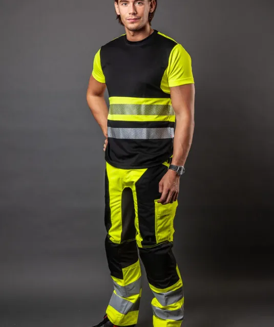 6513 SIGNALISATIEBROEK MET KNIEZAKKEN EN SPIJKERZAKKEN EN ISO 20471 KLASSE 2 Geel