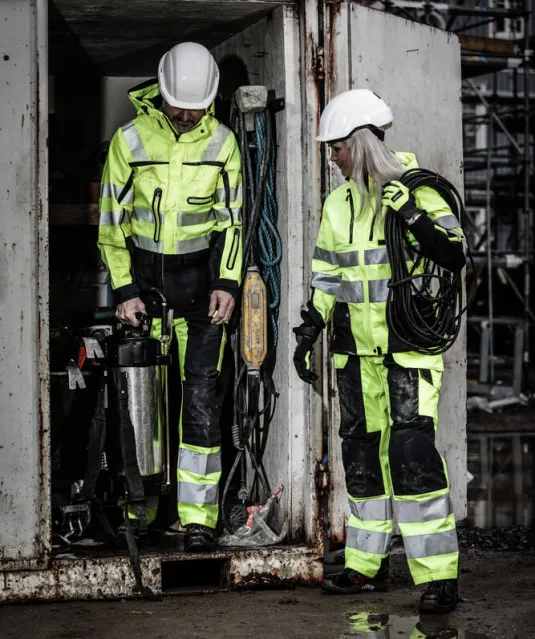 6506 SIGNALISATIEBROEK MET KNIEZAKKEN EN SPIJKERZAKKEN EN ISO 20471 KLASSE 2 Geel